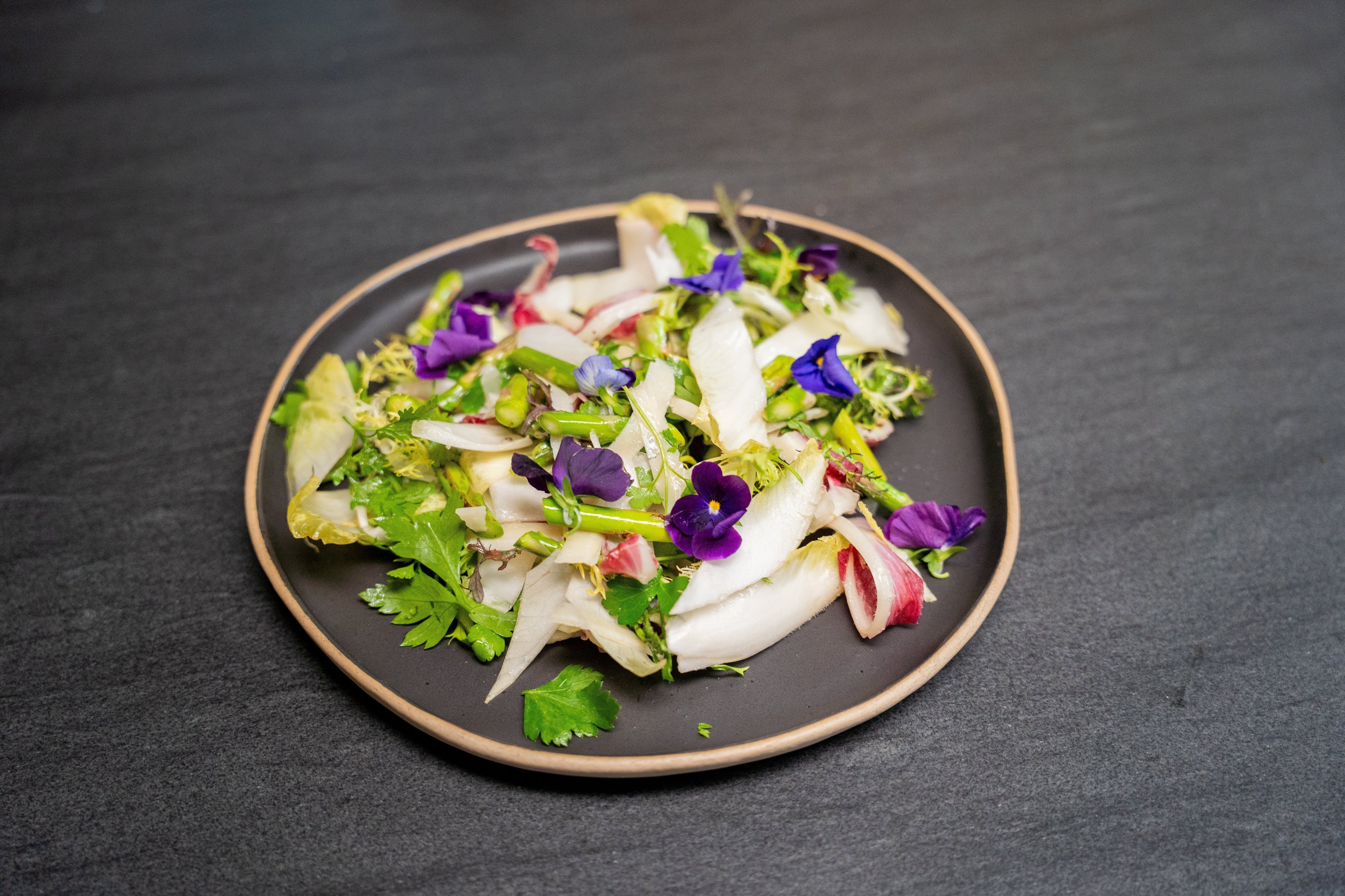 Easter salad with flash-fried asparagus, bitter greens and a fresh lemon-mustard vinaigrette